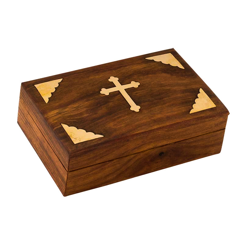 Hand-carved wooden Orthodox prayer box with Christian cross on the lid.